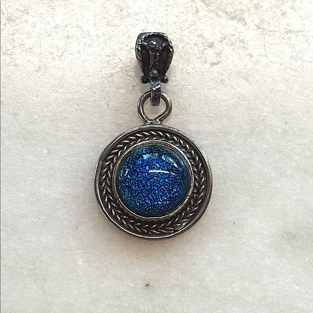 Sterling Silver NWOT Handcrafted Pendant with blue sparkling center